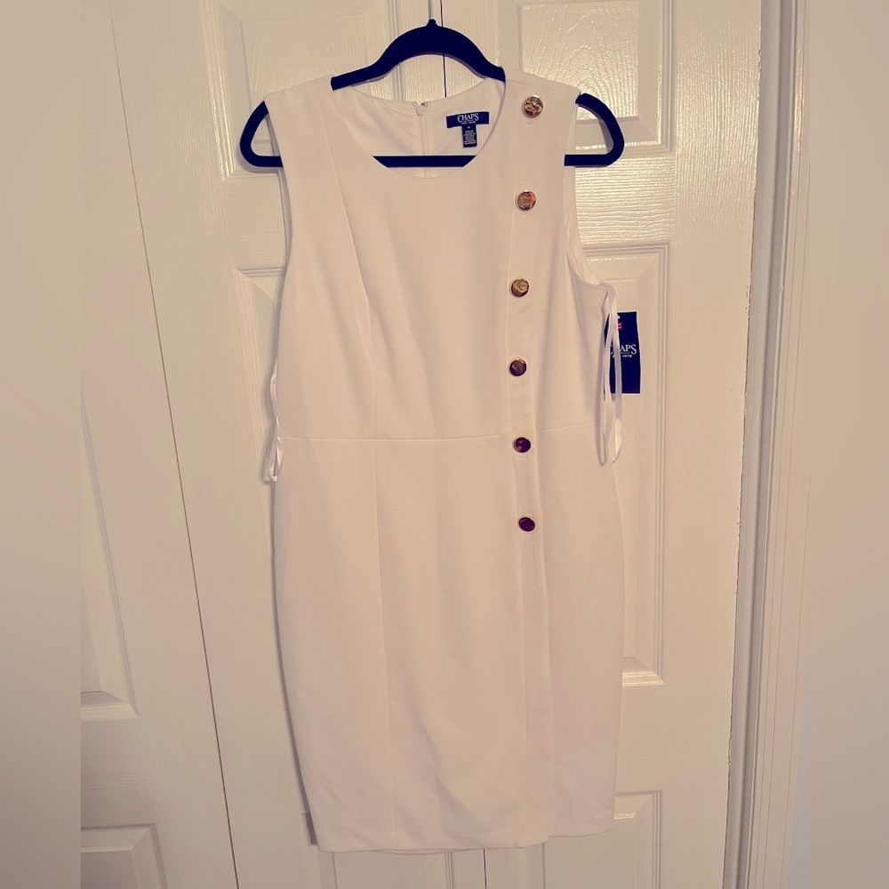 White dress with gold button detail
